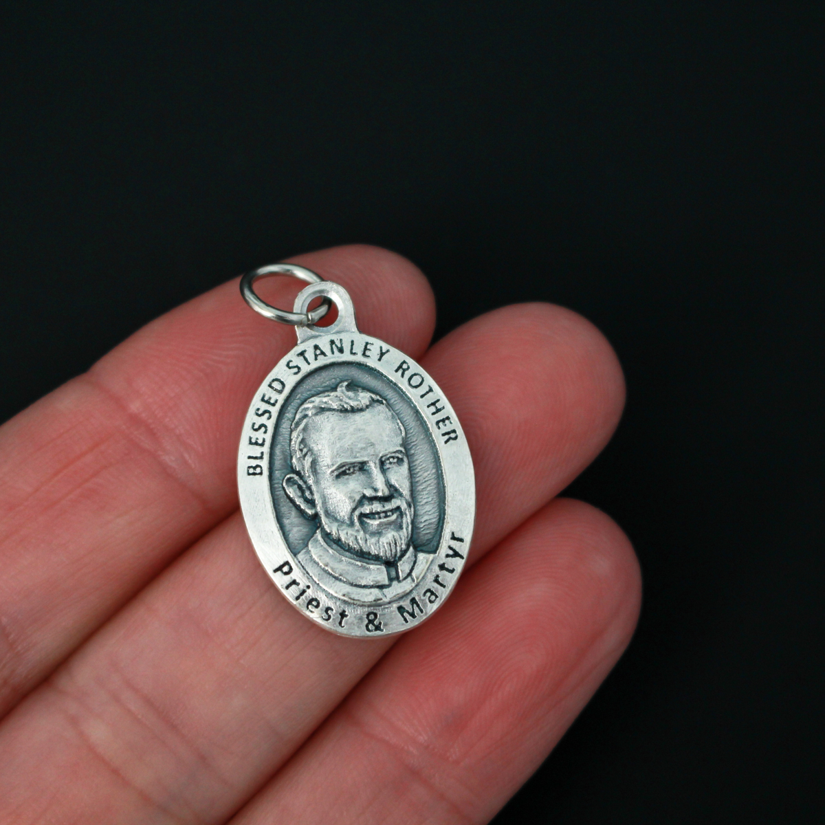 Blessed Stanley Rother medal that depicts the priest on the front and is marked "Pray for us" on the back.