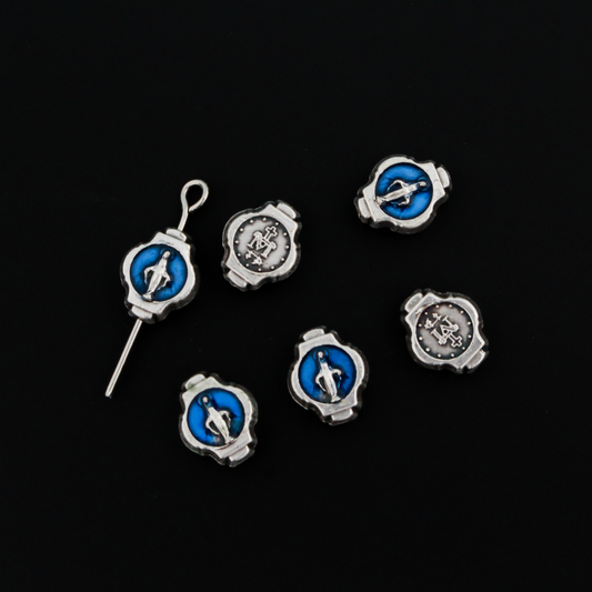 Miraculous Medal oval beads that are silver oxidized base metal made in Italy. The front side of the bead has blue enamel detail, the backside does not