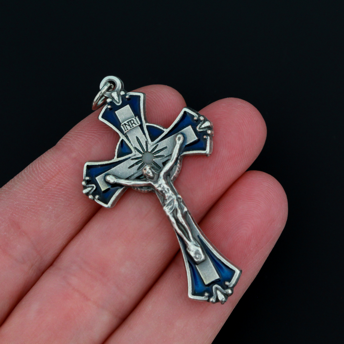 Blue enamel crucifix cross with flared edges. This beautifully detailed cross is handmade in Italy and is 1-7/8" long