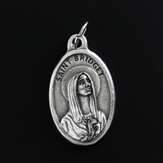Saint Bridget of Sweden medal that depicts the saint on the front and is marked "Pray For Us" on the back.