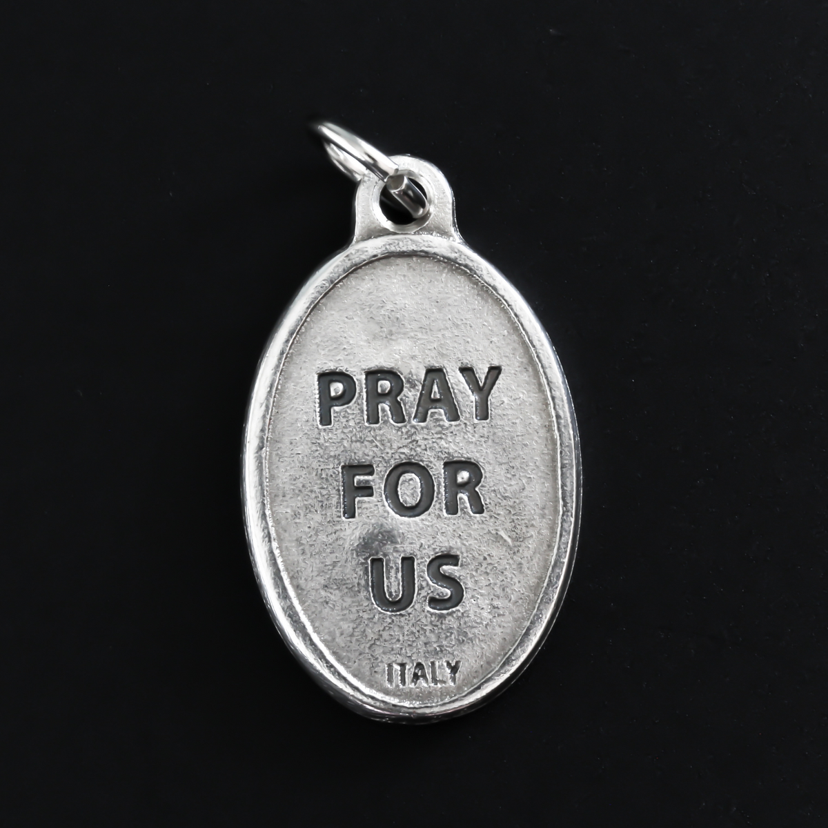 Saint Bridget of Sweden medal that depicts the saint on the front and is marked "Pray For Us" on the back.