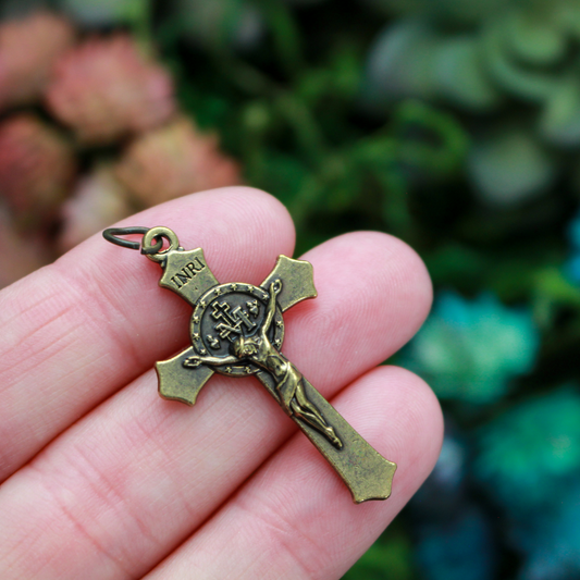 Bronze Miraculous Medal crucifix that features flared edges and a detailed Miraculous Medal, front and back