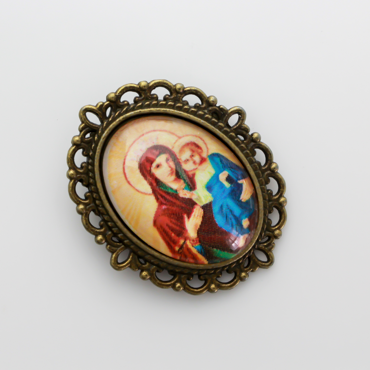 Bronze oval bezel brooch pin with an ornate filigree border. The tray size on this bezel is 25mm x 18mm