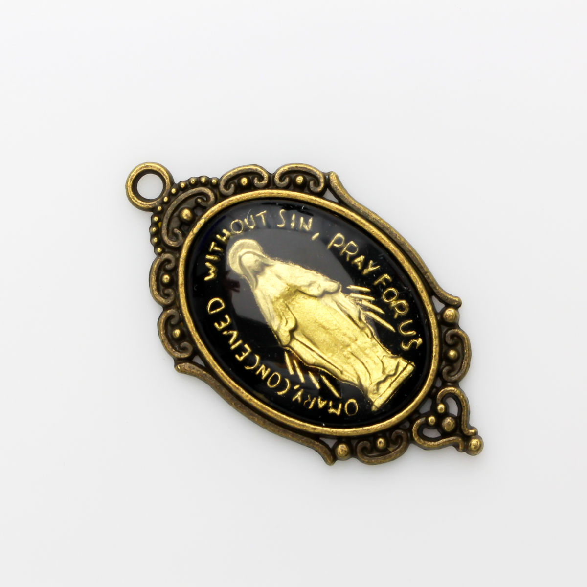 Ornate oval antiqued bronze bezel with an open back, the tray fits 25mm x 18mm cabochons.
