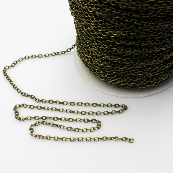 Iron cable chain that has soldered links that are oval in shape and antiqued bronze color. Sold in lengths of 5 feet.