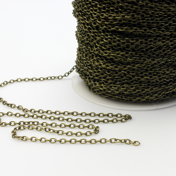 Iron cable chain that has soldered links that are oval in shape and antiqued bronze color. Sold in lengths of 5 feet.