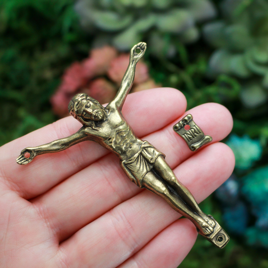 A beautifully detailed bronze corpus that comes with an INRI scroll sign