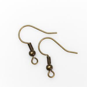 Brass earring hooks with a horizontal loop and an antiqued bronze finish. 23 gauge wire. Sold in packages of 30 hooks (15 pairs).