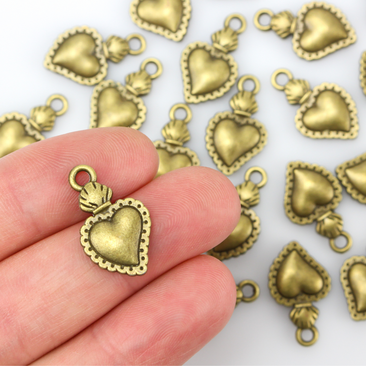 bronze sacred heart milagro flaming heart pendant