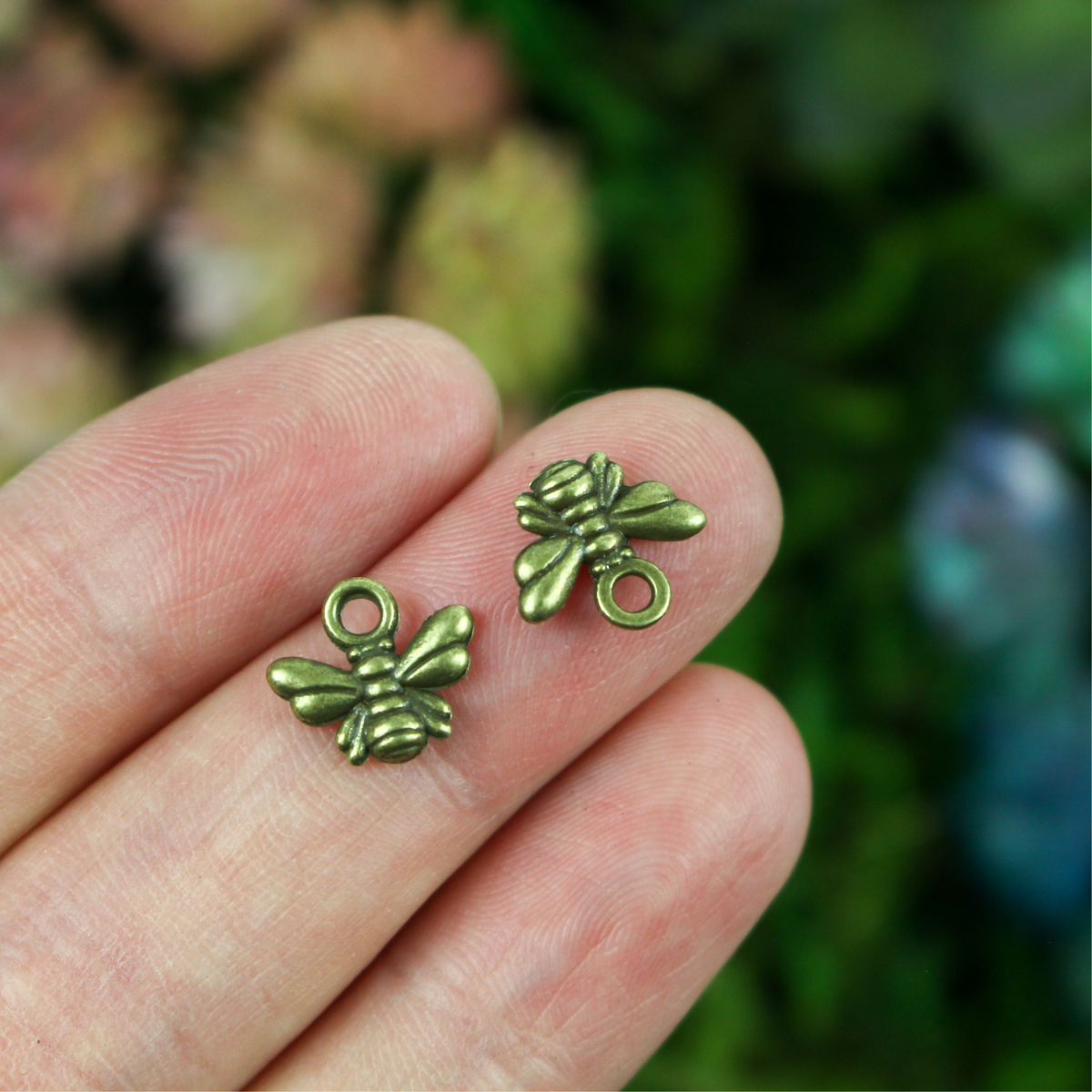 Small bronze honey bee charms for jewelry marking or craft projects