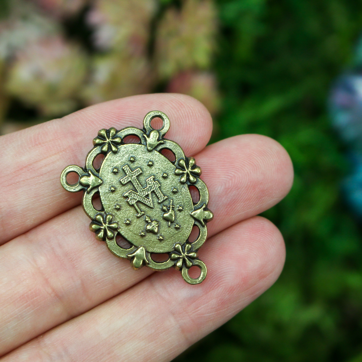 Traditional Miraculous Medal rosary centerpiece in an antiqued bronze color