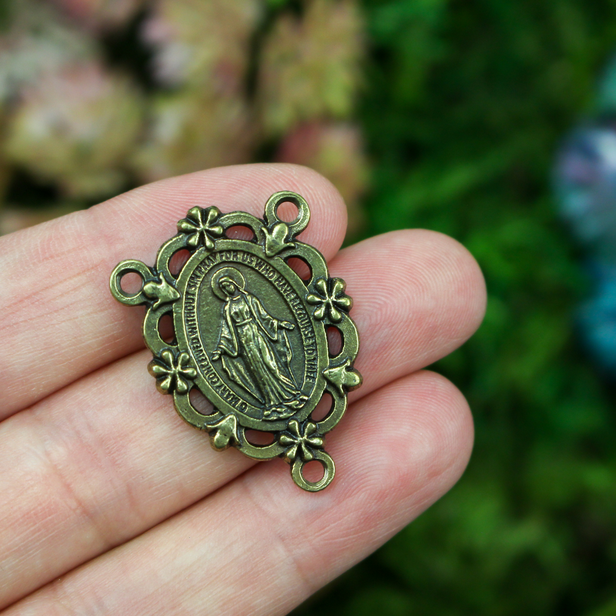 Traditional Miraculous Medal rosary centerpiece in an antiqued bronze color