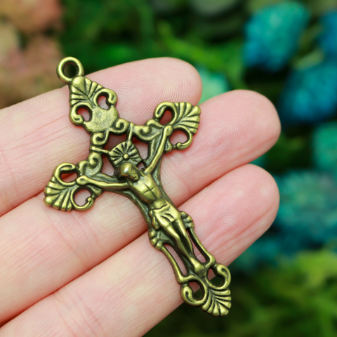 Three ornate fleur de lis crucifix cross in an antiqued bronze color and filigree cut out design, 2-1/8" long