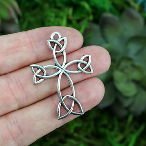 silver tone celtic cross pendant with trinity knot design