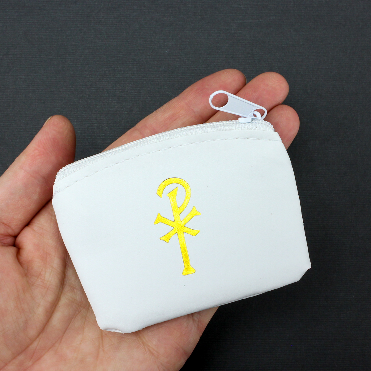 white vinyl rosary case with a gold chi rho symbol on one side