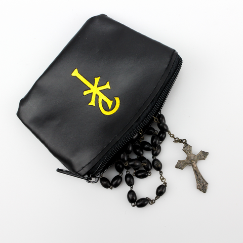 black vinyl rosary case with a gold chi rho symbol on one side