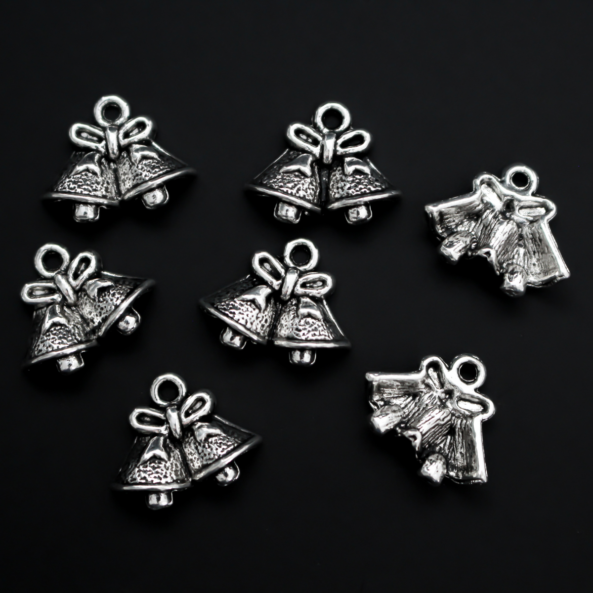 Silver tone Christmas bell charms, 14mm long
