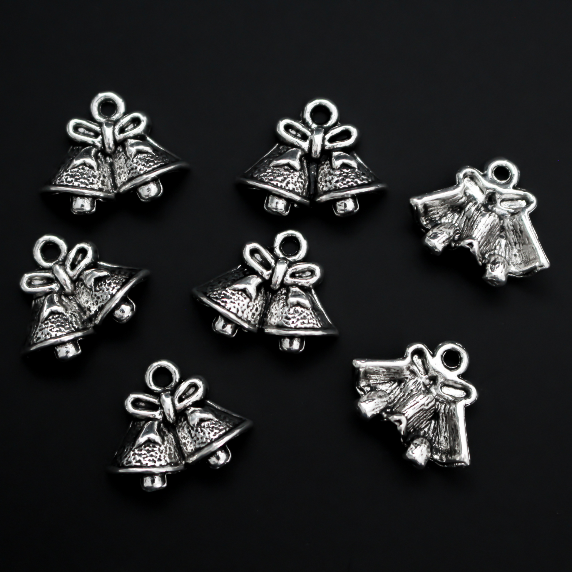 Silver tone Christmas bell charms, 14mm long