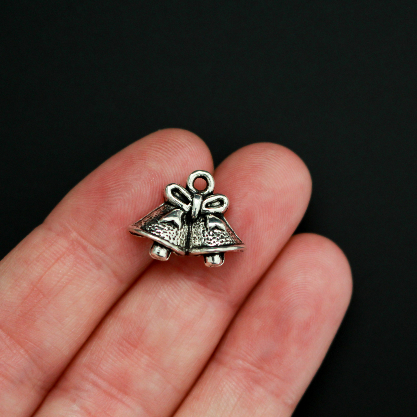 Silver tone Christmas bell charms, 14mm long