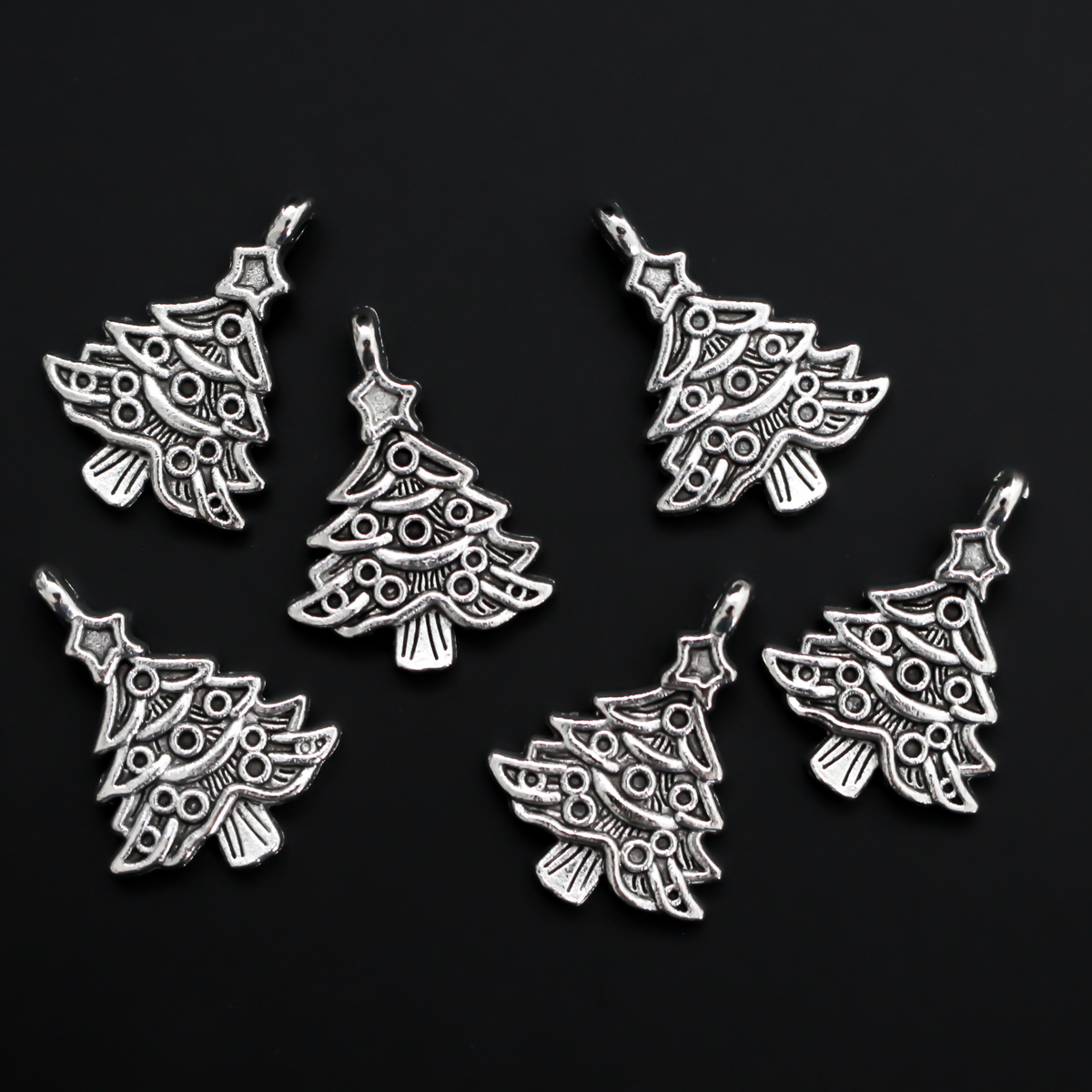 Silver tone Christmas tree charms, 24mm long