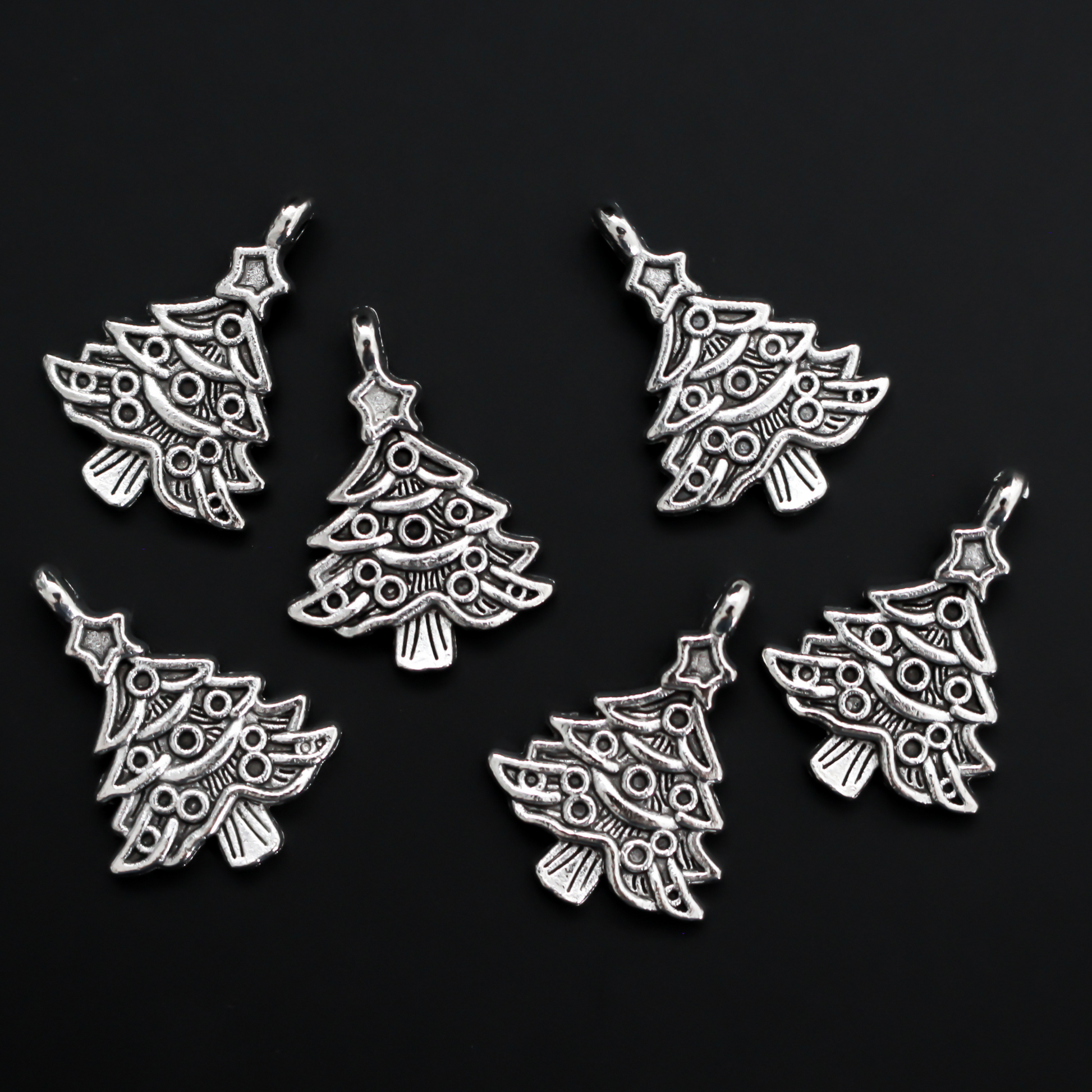 Silver tone Christmas tree charms, 24mm long