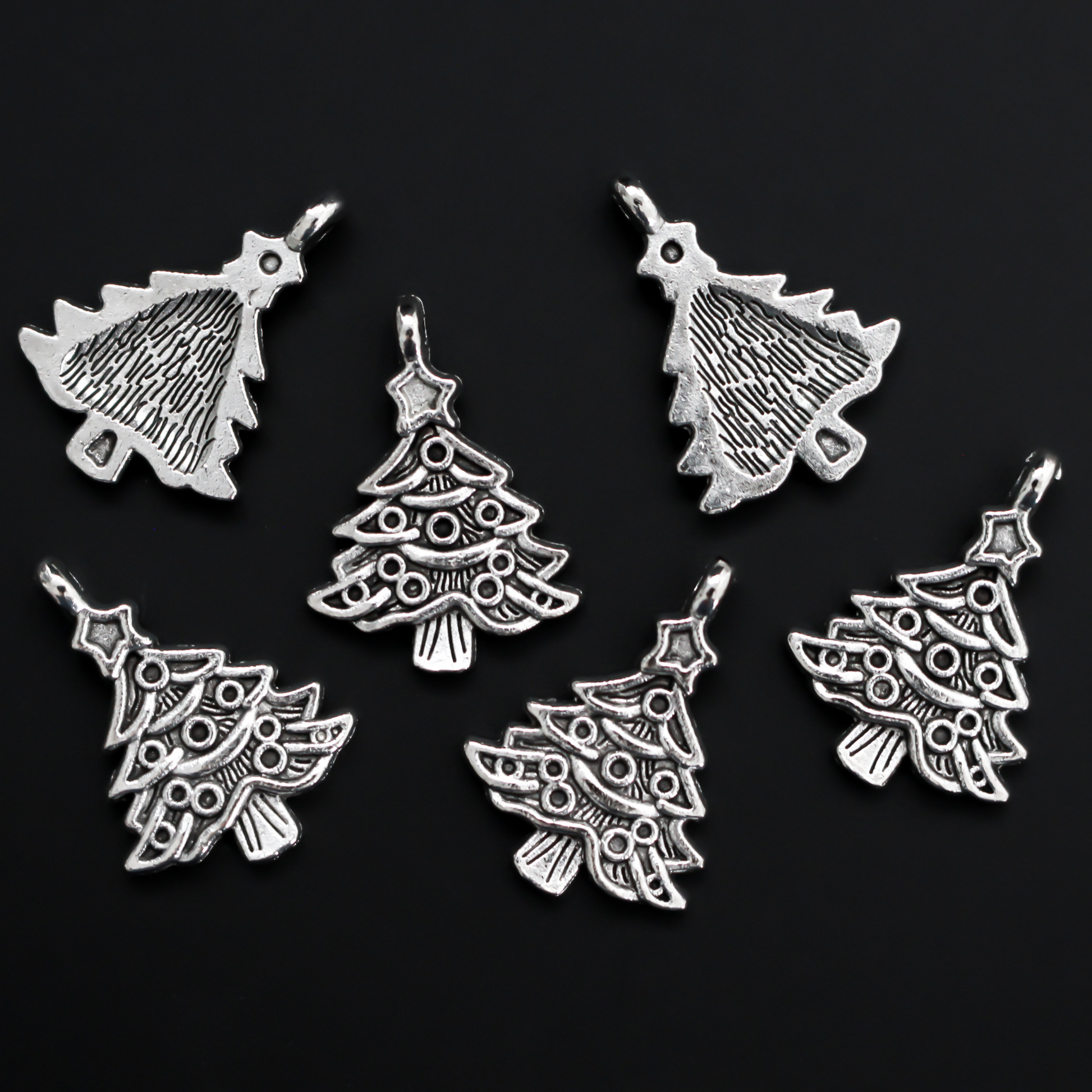 Silver tone Christmas tree charms, 24mm long