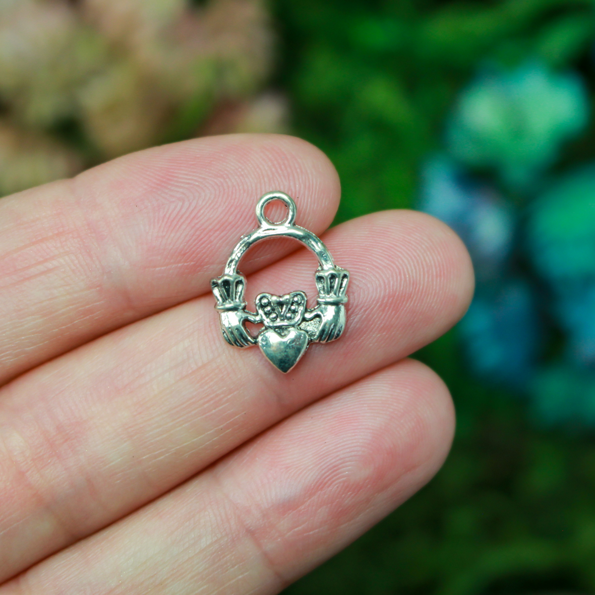 Irish Claddagh symbol charms in an antiqued silver finish, 18mm long