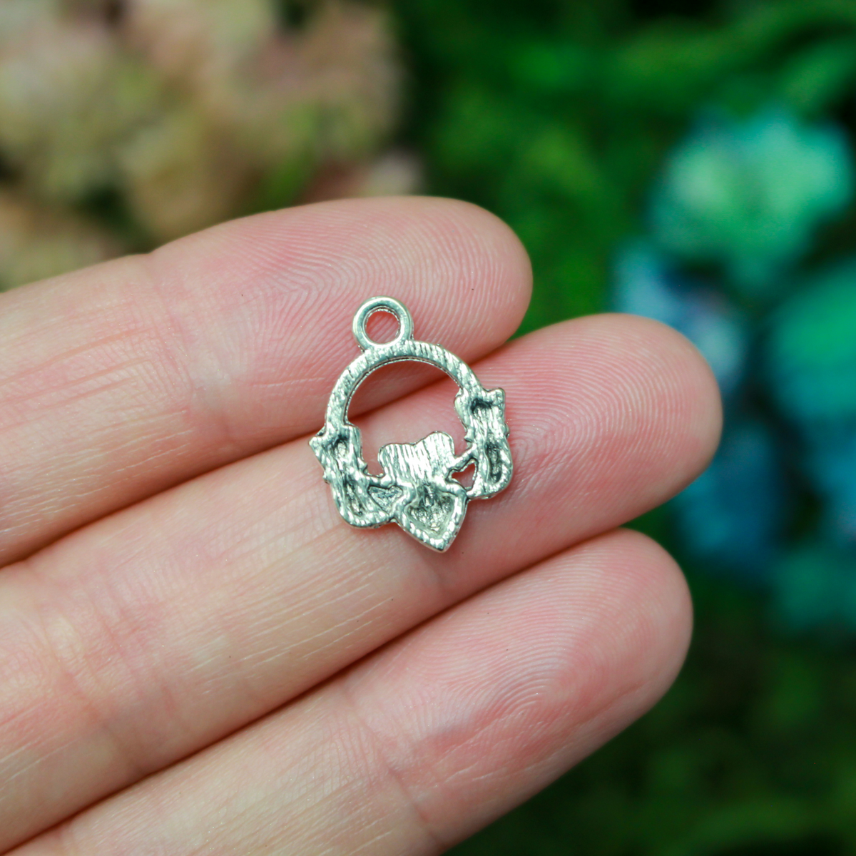 Irish Claddagh symbol charms in an antiqued silver finish, 18mm long