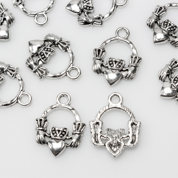 Irish Claddagh symbol charms in an antiqued silver finish, 18mm long