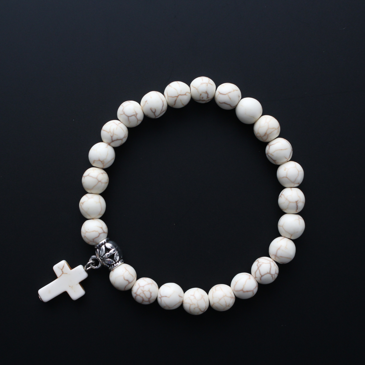 Stretch charm bracelets with synthetic turquoise beads in an off-white/beige color