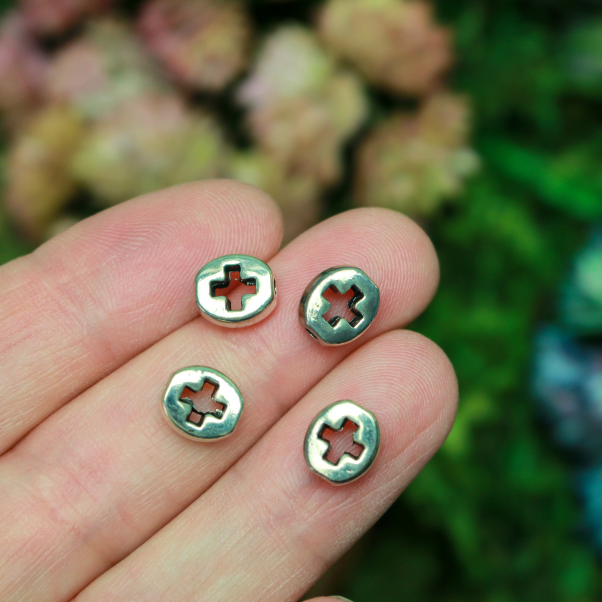 Silver metal spacer beads with a cross cutout design, 6.5mm x 5.5mm