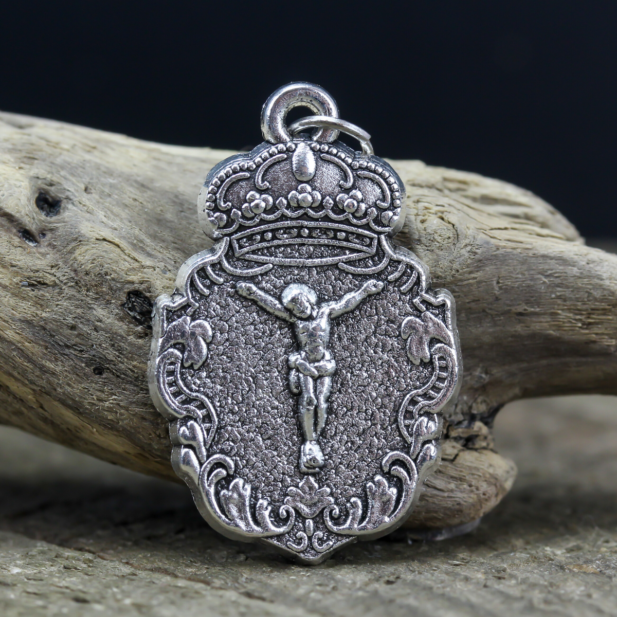ornate jesus crucifixion medal