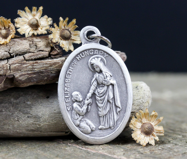 die cast silver medal depicting patron saint elizabeth of hungary