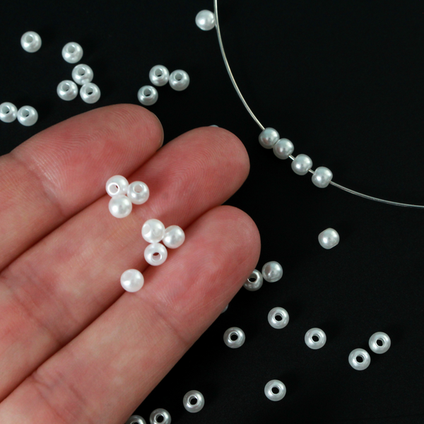 Plastic imitation pearl beads that are small and perfect for spacer beads, 4mm round