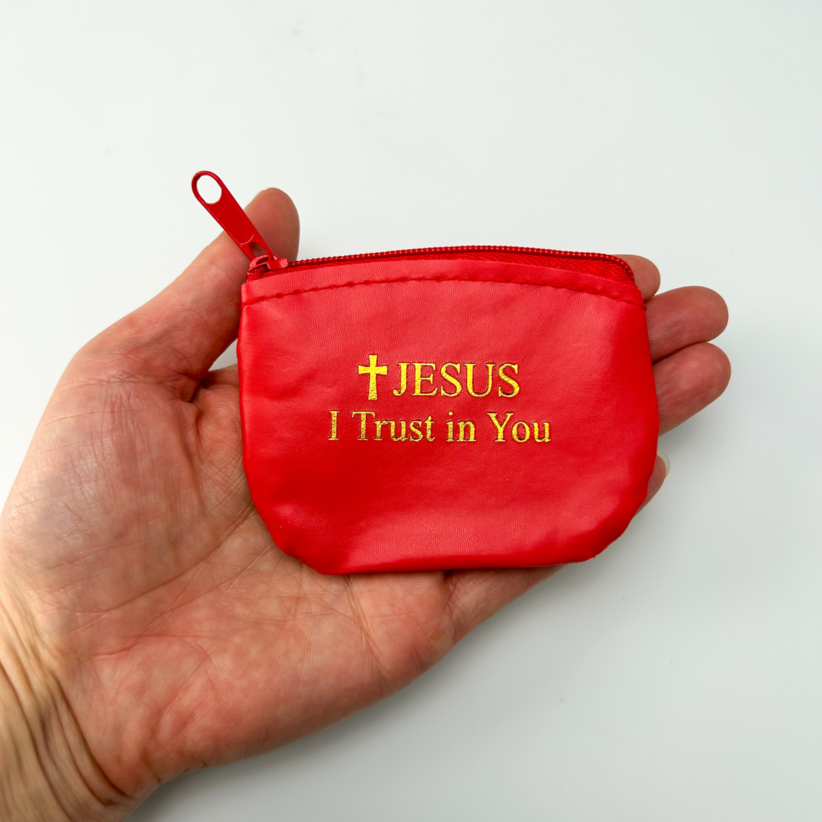 Jesus I trust in you rosary case that is red vinyl with gold lettering and a red metal zipper closure