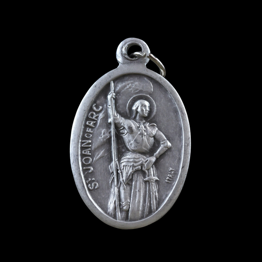 die cast silver medal depicting patron saint joan of arc