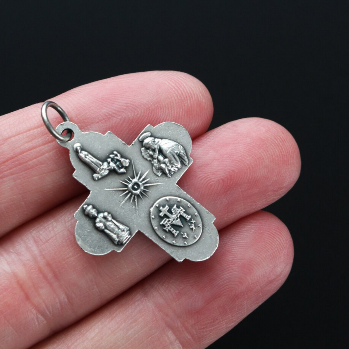 Five way cross that features five of the Church's most beloved medals all combined on the symbol of the sacred Cross 1-1/8" long