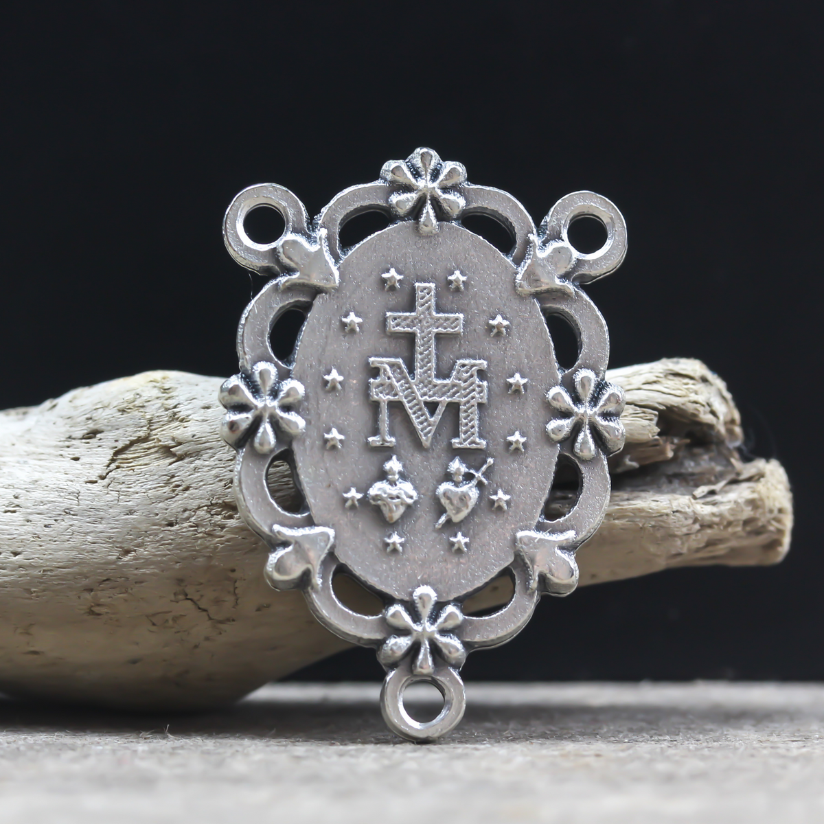 miraculous medal rosary centerpiece with ornate floral border