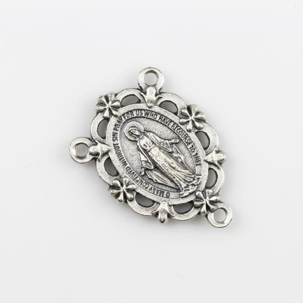 miraculous medal rosary centerpiece with ornate floral border
