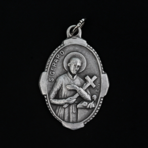 Saint Gerard Majella deluxe ornate medal that depicts the saint holding a cross on the front and "Pray For Us" on the back
