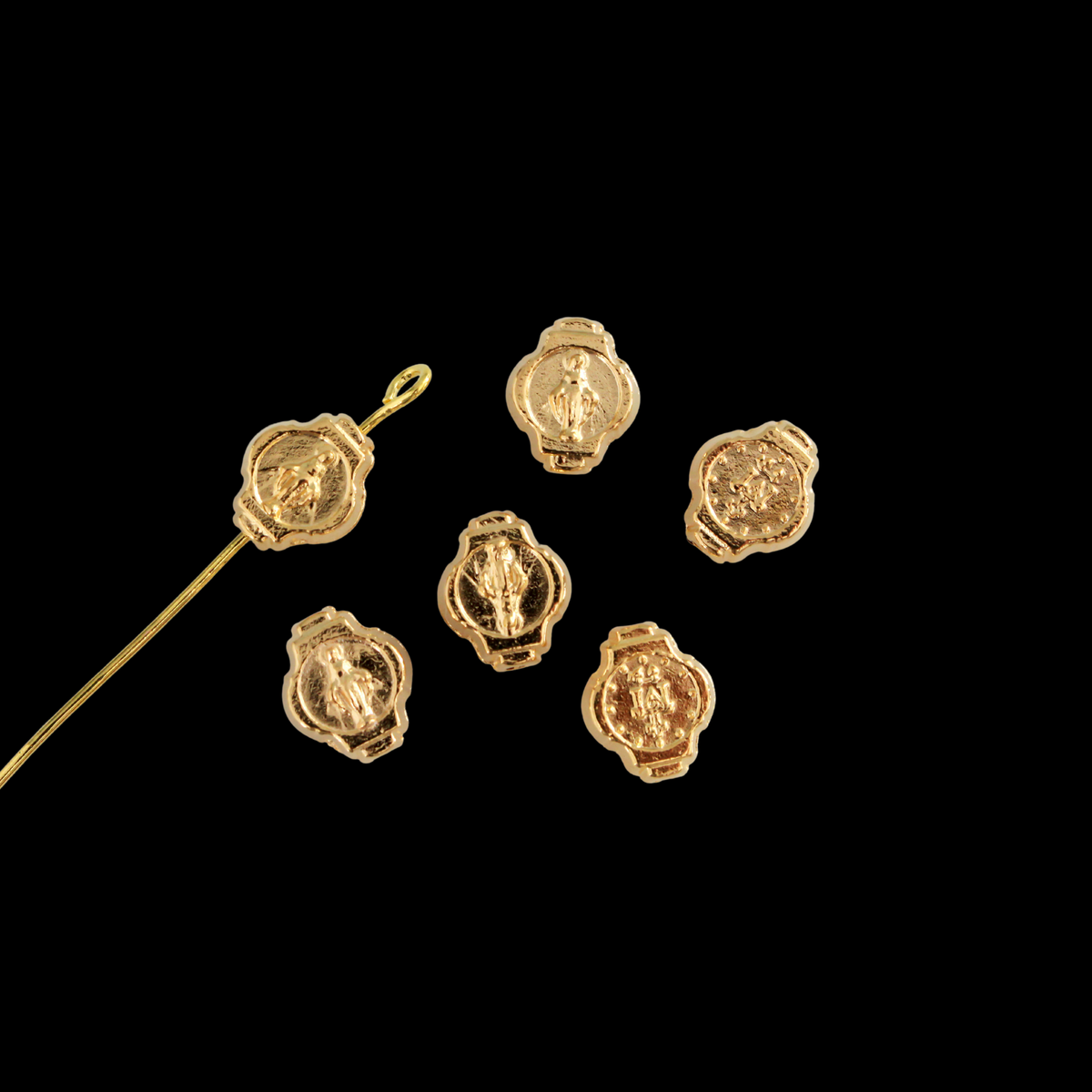 Miraculous Medal oval beads beads that are gold plated with an alloy base metal, made in Italy