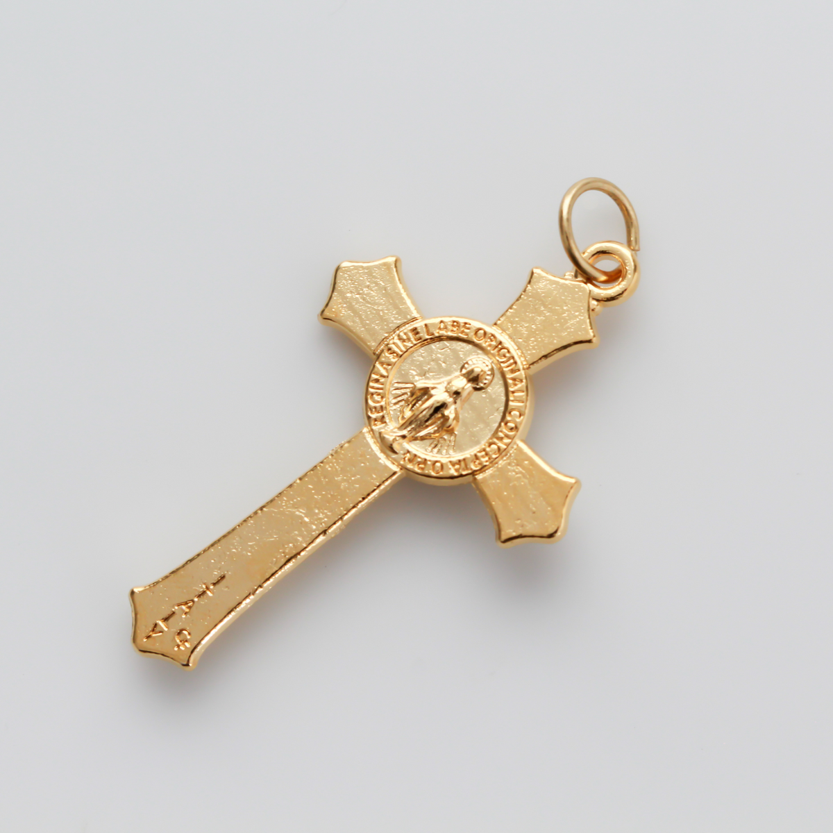 Gold Miraculous Medal crucifix that features flared edges and a detailed Miraculous Medal, front and back