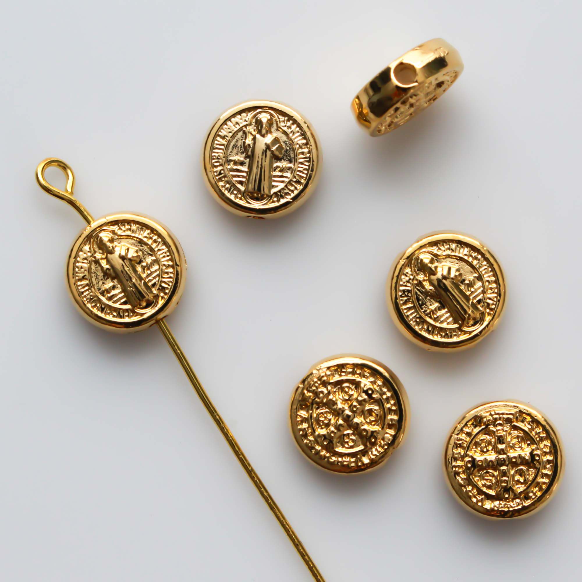 Saint Benedict Medal round flat beads that a gold plated with an alloy base metal, made in Italy