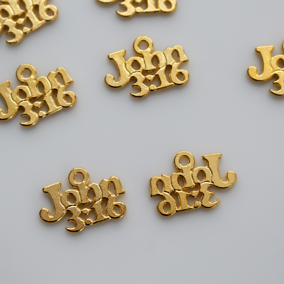 John 3:16 charms in a shiny gold finish, 19mm x 13mm
