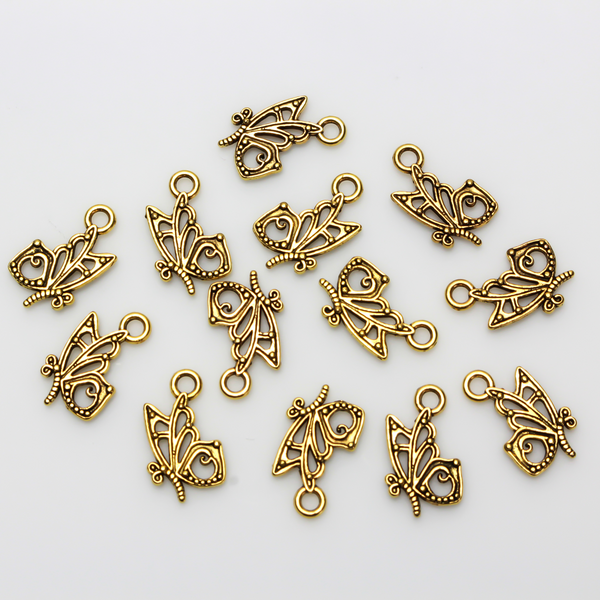 Butterfly charms in an antiqued golden finish, 16mm long