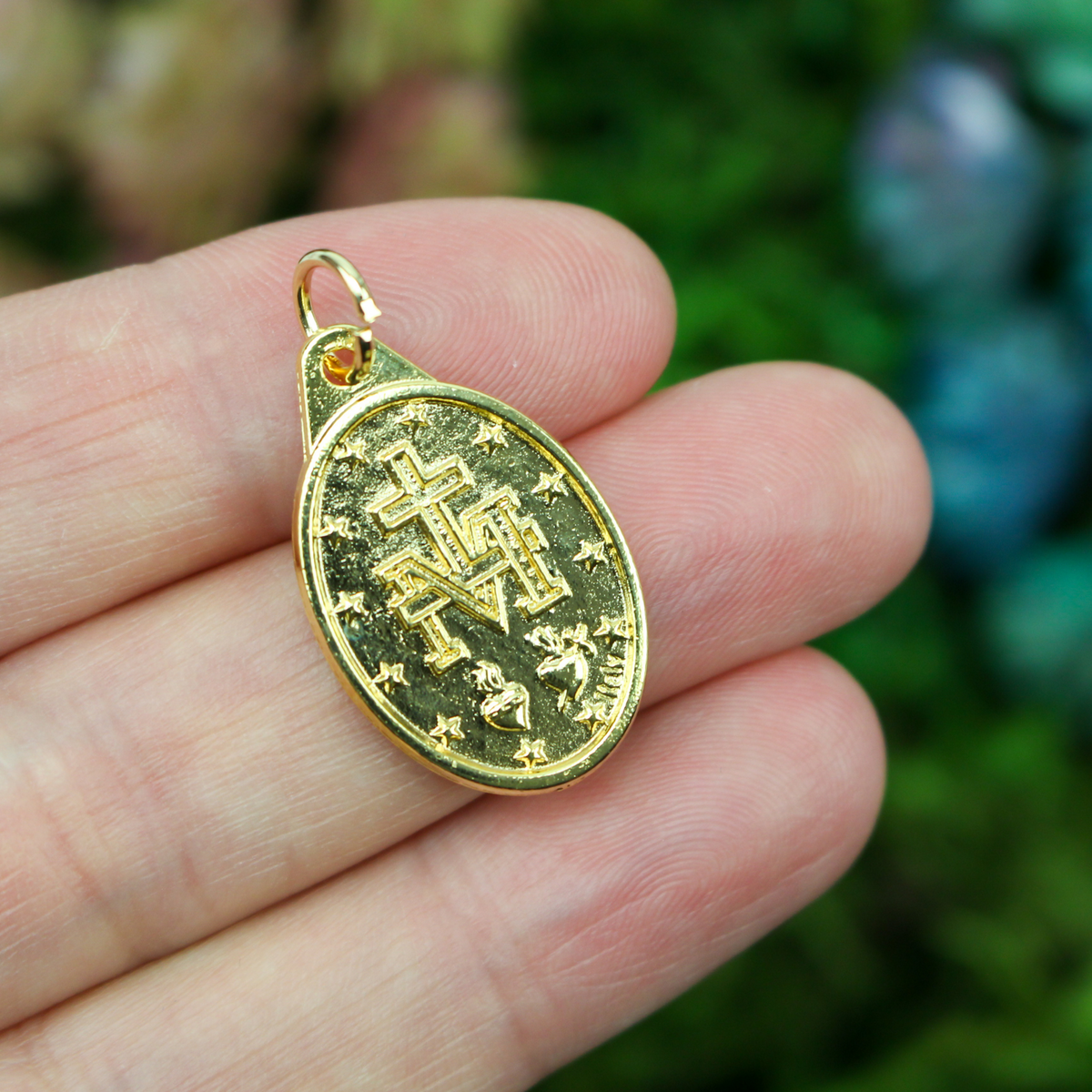 Traditional Miraculous Mary medal in English that is gold plated