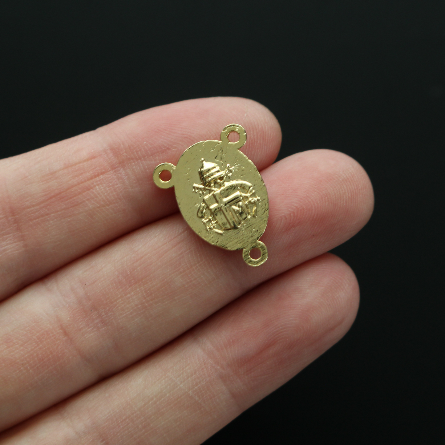 Our lady of Grace rosary centerpiece with the Catholic Coat of Arms on the reverse side, gold tone color