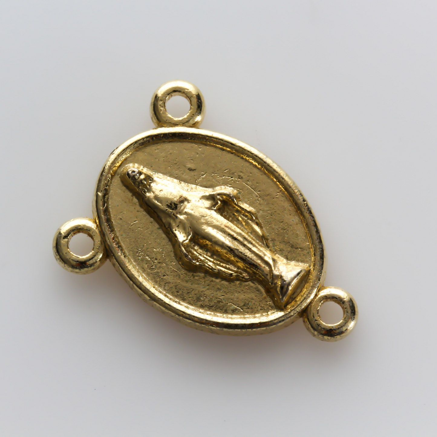 Our lady of Grace rosary centerpiece with the Catholic Coat of Arms on the reverse side, gold tone color