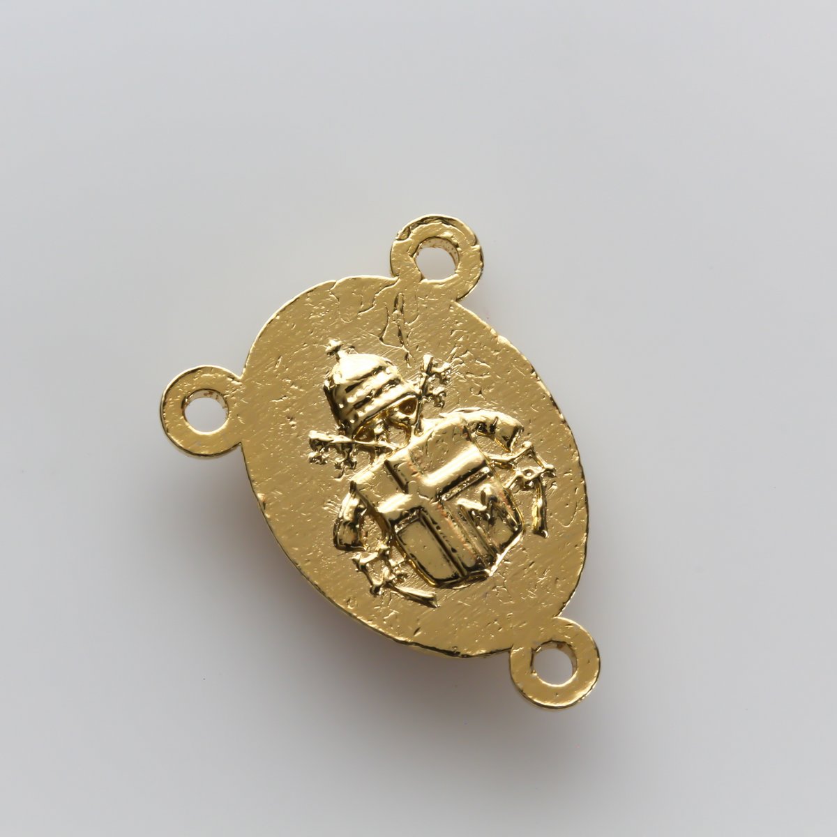 Our lady of Grace rosary centerpiece with the Catholic Coat of Arms on the reverse side, gold tone color