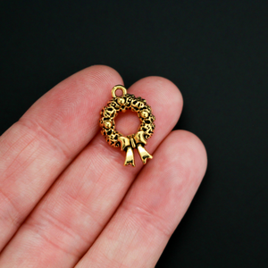Gold tone Christmas wreath charms, 19mm long